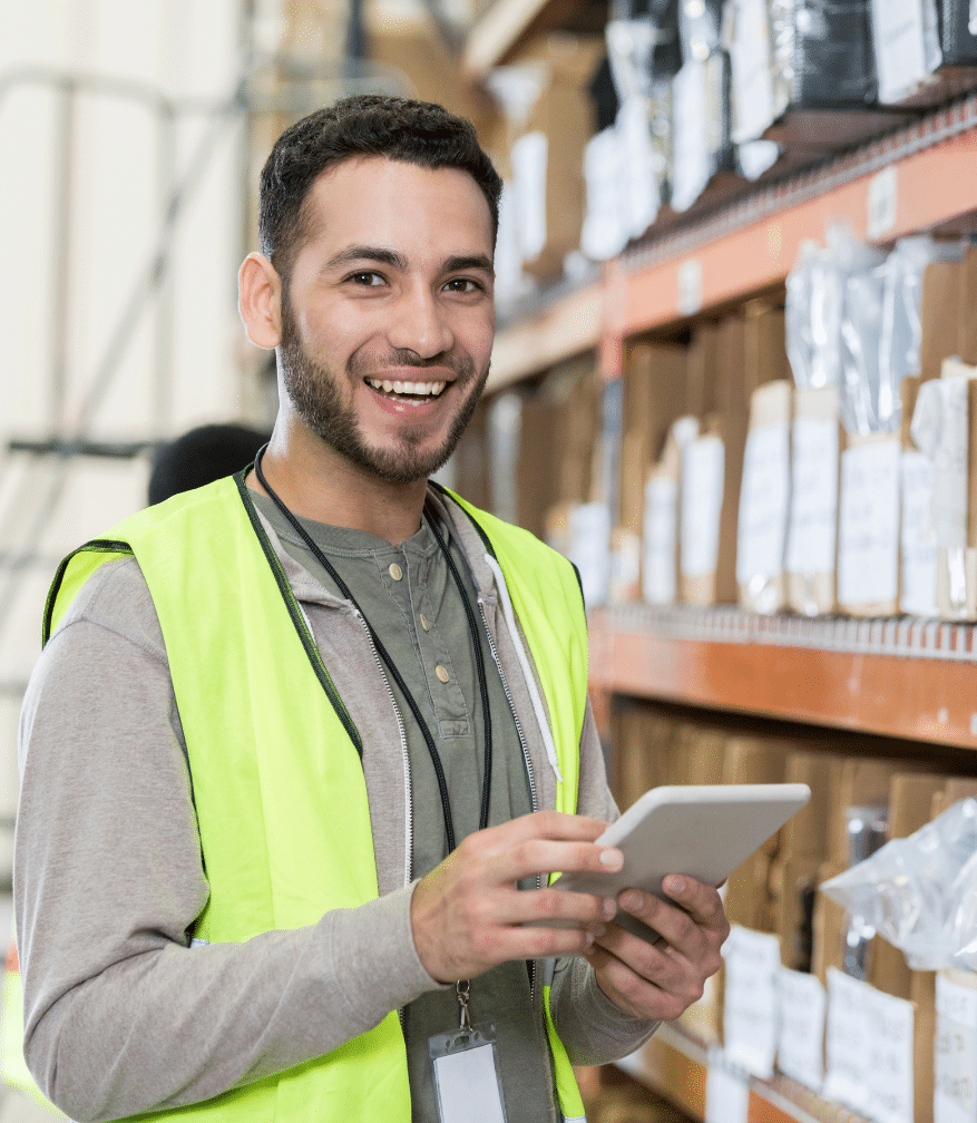 warehouse employee holding tablet